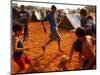 Children Play Soccer Between Tents Placed on a Dusty Lot-null-Mounted Photographic Print