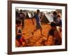 Children Play Soccer Between Tents Placed on a Dusty Lot-null-Framed Photographic Print