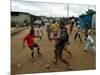 Children Play Soccer in an Impoverished Street in Lagos, Nigeria-null-Mounted Photographic Print