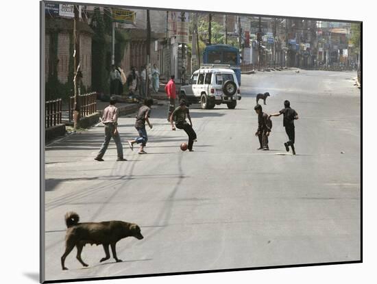 Children Play Soccer on a Deserted Street of Katmandu, Nepal-null-Mounted Photographic Print
