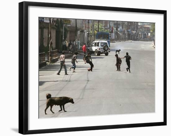 Children Play Soccer on a Deserted Street of Katmandu, Nepal-null-Framed Photographic Print