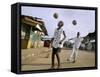 Children Play Soccer on a Street-null-Framed Stretched Canvas