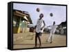 Children Play Soccer on a Street-null-Framed Stretched Canvas