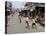 Children Play Soccer on One of the Streets of the Business District of Lagos-null-Stretched Canvas