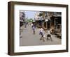 Children Play Soccer on One of the Streets of the Business District of Lagos-null-Framed Photographic Print