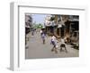 Children Play Soccer on One of the Streets of the Business District of Lagos-null-Framed Photographic Print