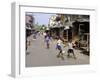 Children Play Soccer on One of the Streets of the Business District of Lagos-null-Framed Photographic Print