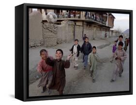 Children Play with a Soccer Ball-null-Framed Stretched Canvas