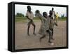 Children Play with Homemade Soccer Balls Made from Discarded Medical Gloves-null-Framed Stretched Canvas