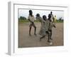 Children Play with Homemade Soccer Balls Made from Discarded Medical Gloves-null-Framed Premium Photographic Print