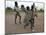 Children Play with Homemade Soccer Balls Made from Discarded Medical Gloves-null-Mounted Photographic Print