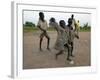 Children Play with Homemade Soccer Balls Made from Discarded Medical Gloves-null-Framed Photographic Print