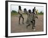 Children Play with Homemade Soccer Balls Made from Discarded Medical Gloves-null-Framed Photographic Print