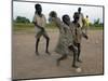 Children Play with Homemade Soccer Balls Made from Discarded Medical Gloves-null-Mounted Photographic Print