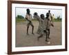 Children Play with Homemade Soccer Balls Made from Discarded Medical Gloves-null-Framed Photographic Print