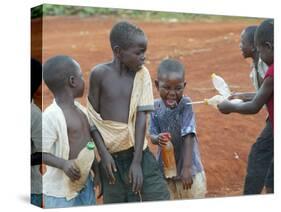 Children Play with Water Near a Zimbabwean Movement for Democratic Change (MDC) Election Rally-null-Stretched Canvas