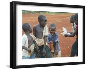 Children Play with Water Near a Zimbabwean Movement for Democratic Change (MDC) Election Rally-null-Framed Photographic Print