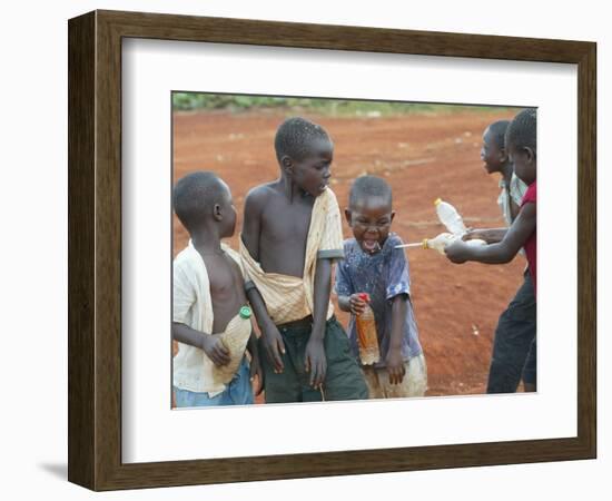 Children Play with Water Near a Zimbabwean Movement for Democratic Change (MDC) Election Rally-null-Framed Photographic Print