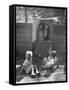 Children Playing in a Toy Made by Charles Eames-Allan Grant-Framed Stretched Canvas