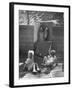 Children Playing in a Toy Made by Charles Eames-Allan Grant-Framed Photographic Print