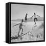 Children Playing in the Desert Sand-Nat Farbman-Framed Stretched Canvas