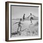 Children Playing in the Desert Sand-Nat Farbman-Framed Photographic Print