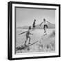 Children Playing in the Desert Sand-Nat Farbman-Framed Photographic Print