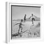 Children Playing in the Desert Sand-Nat Farbman-Framed Photographic Print