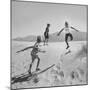 Children Playing in the Desert Sand-Nat Farbman-Mounted Photographic Print