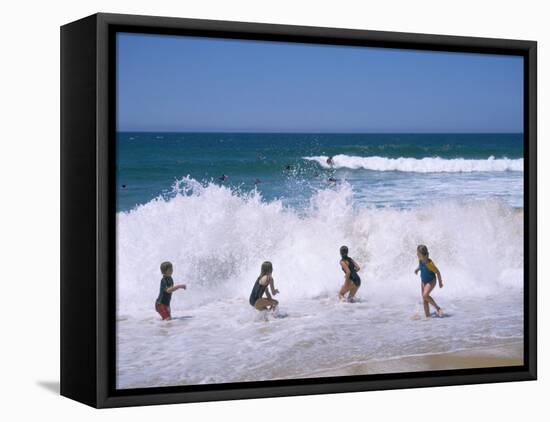 Children Playing in the Surf, Near Gosford, New South Wales, Australia-Ken Wilson-Framed Stretched Canvas