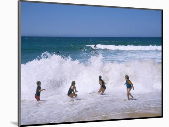 Children Playing in the Surf, Near Gosford, New South Wales, Australia-Ken Wilson-Mounted Photographic Print