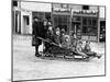 Children Playing on Sleigh in Seward, Alaska Photograph - Seward, AK-Lantern Press-Mounted Art Print