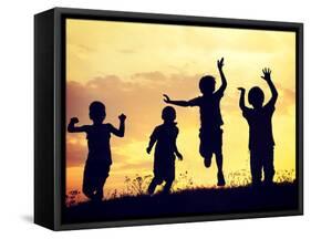 Children Playing on Summer Sunset Meadow-zurijeta-Framed Stretched Canvas