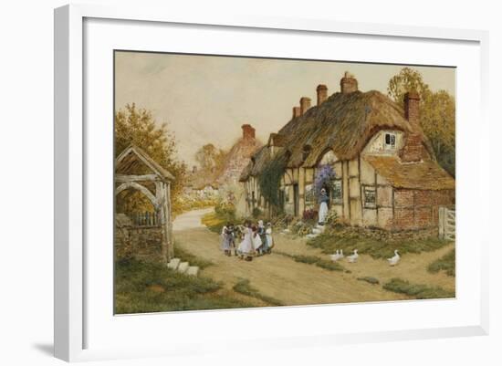 Children Playing Outside a Cottage in a Village-Arthur Claude Strachan-Framed Giclee Print