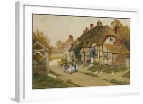 Children Playing Outside a Cottage in a Village-Arthur Claude Strachan-Framed Giclee Print