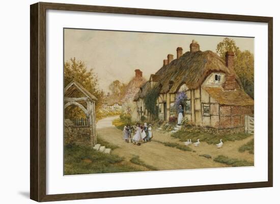 Children Playing Outside a Cottage in a Village-Arthur Claude Strachan-Framed Giclee Print