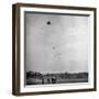 Children Playing with Kite That Releases Toys While in the Air-Bernard Hoffman-Framed Photographic Print