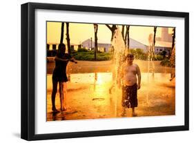 Children Playing with Water Fountains in Battery Park at Sunset,-Sabine Jacobs-Framed Photographic Print