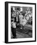 Children Reciting the Pledge of Allegiance as a Boy Holds the Us Flag in their Classroom-Bernard Hoffman-Framed Photographic Print