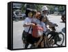 Children Riding on a Motor Scooter, Phnom Penh, Cambodia, Indochina, Southeast Asia-Bruno Morandi-Framed Stretched Canvas