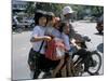 Children Riding on a Motor Scooter, Phnom Penh, Cambodia, Indochina, Southeast Asia-Bruno Morandi-Mounted Photographic Print