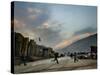 Children Run Across the Street as Spring Temperatures Return to Kabul-null-Stretched Canvas