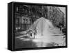 Children Running Around under Sprinkler in Street to Cool Off During Summer, in South Harlem-null-Framed Stretched Canvas