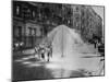 Children Running Around under Sprinkler in Street to Cool Off During Summer, in South Harlem-null-Mounted Photographic Print