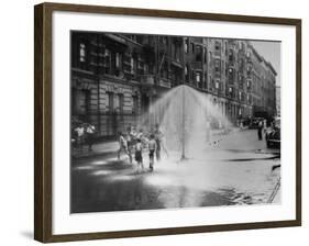 Children Running Around under Sprinkler in Street to Cool Off During Summer, in South Harlem-null-Framed Photographic Print