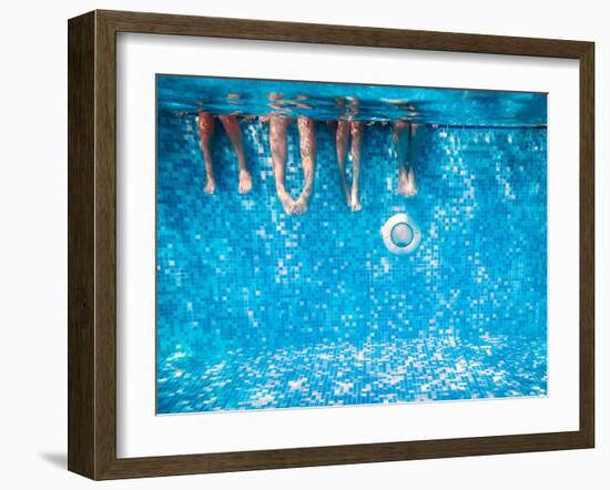 Children's and Adults Legs Underwater in the Swimming Pool-Kateryna Mostova-Framed Photographic Print