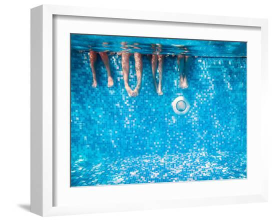 Children's and Adults Legs Underwater in the Swimming Pool-Kateryna Mostova-Framed Photographic Print
