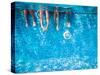 Children's and Adults Legs Underwater in the Swimming Pool-Kateryna Mostova-Stretched Canvas