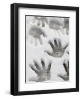 Children's Handprints in a Spring Snow-John Nordell-Framed Premium Photographic Print