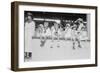 Children Sit on Wall in Front of Stands at the Ballpark and Eat Ice Cream Cones.-null-Framed Art Print